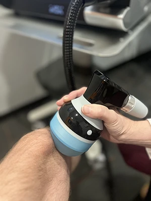 Softwave Therapy on Patient's Knee