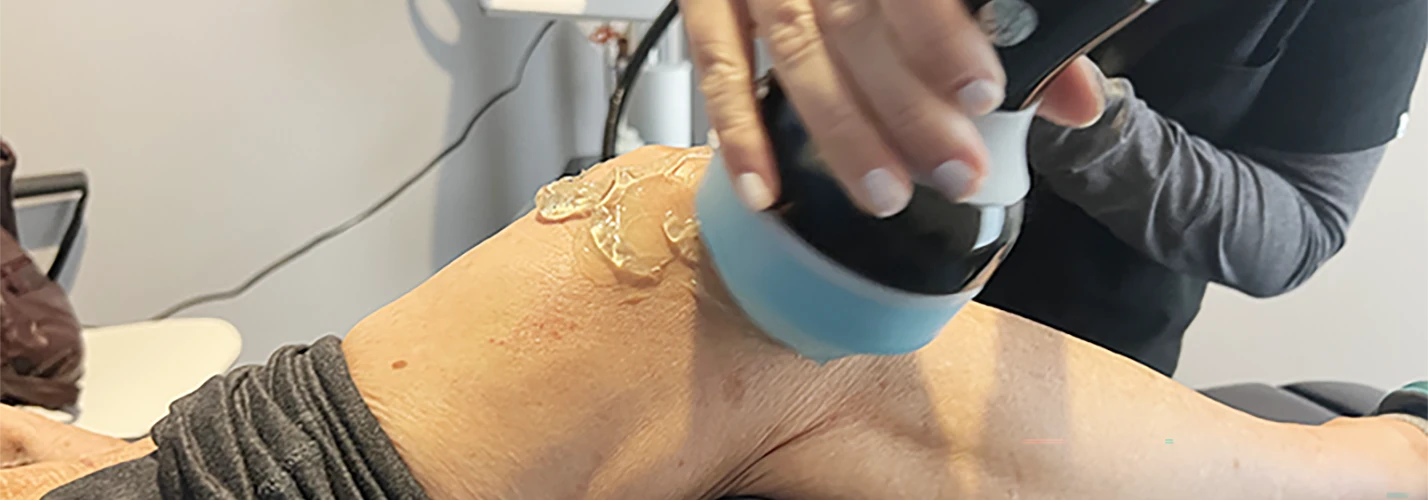 Softwave Therapy on Patient's Knee